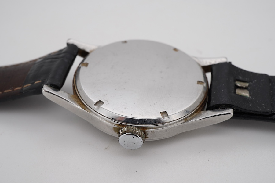 A gentleman's mid 20th century steel Mimo manual wind wrist watch, with black Arabic dial and subsidiary seconds, case diameter 35mm, on a later associated leather strap.